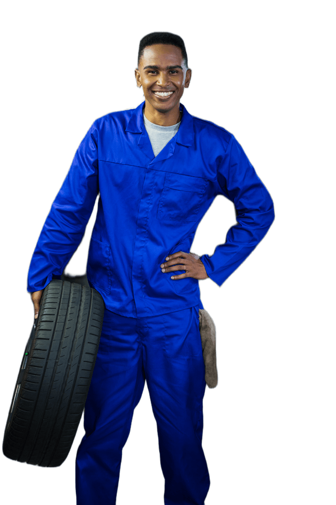 A mechanic holding tyre